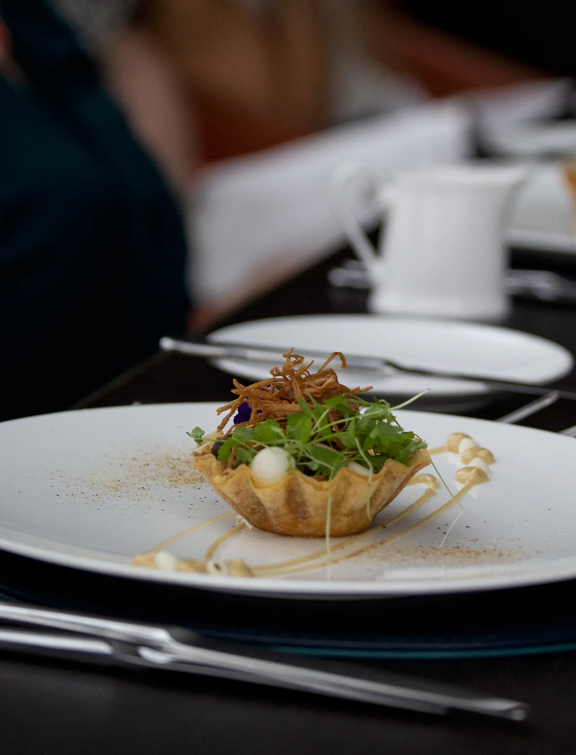 A beautifully plated fine-dining course served at a Strategic Circle Board Day
